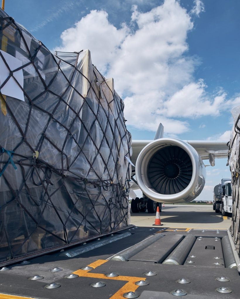loading-of-cargo-containers-to-airplane.jpg